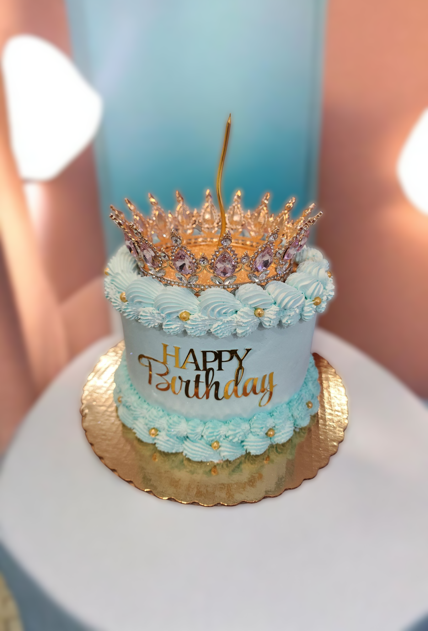 Blue crown birthday cake angle